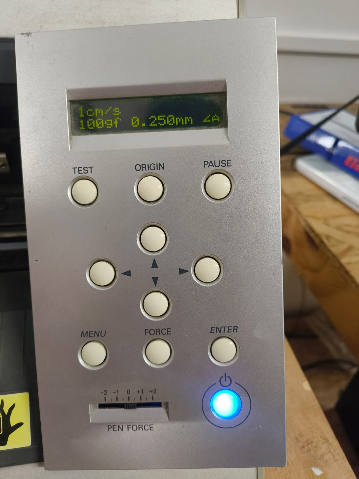 Roland GX-24 control panel showing speed 1cm/s, force 100gf, and blade offset 0.250mm